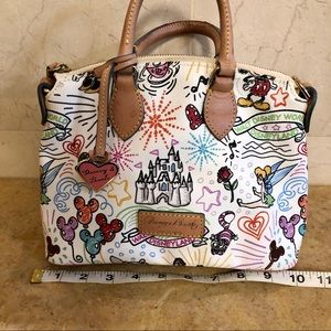 Dooney & Burke Disney sketch design bag.